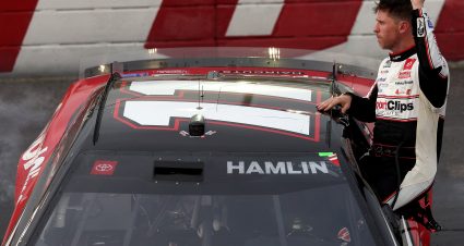DARLINGTON, SOUTH CAROLINA - APRIL 06: Denny Hamlin, driver of the #11 Sport Clips Haircuts Toyota, celebrates after winning the NASCAR Cup Series Goodyear 400 at Darlington Raceway on April 06, 2025 in Darlington, South Carolina. (Photo by James Gilbert/Getty Images) | Getty Images
