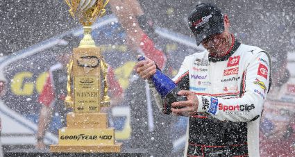 DARLINGTON, SOUTH CAROLINA - APRIL 06: Denny Hamlin, driver of the #11 Sport Clips Haircuts Toyota, celebrates by spraying champagne in victory lane after winning the NASCAR Cup Series Goodyear 400 at Darlington Raceway on April 06, 2025 in Darlington, South Carolina. (Photo by Jared C. Tilton/Getty Images) | Getty Images