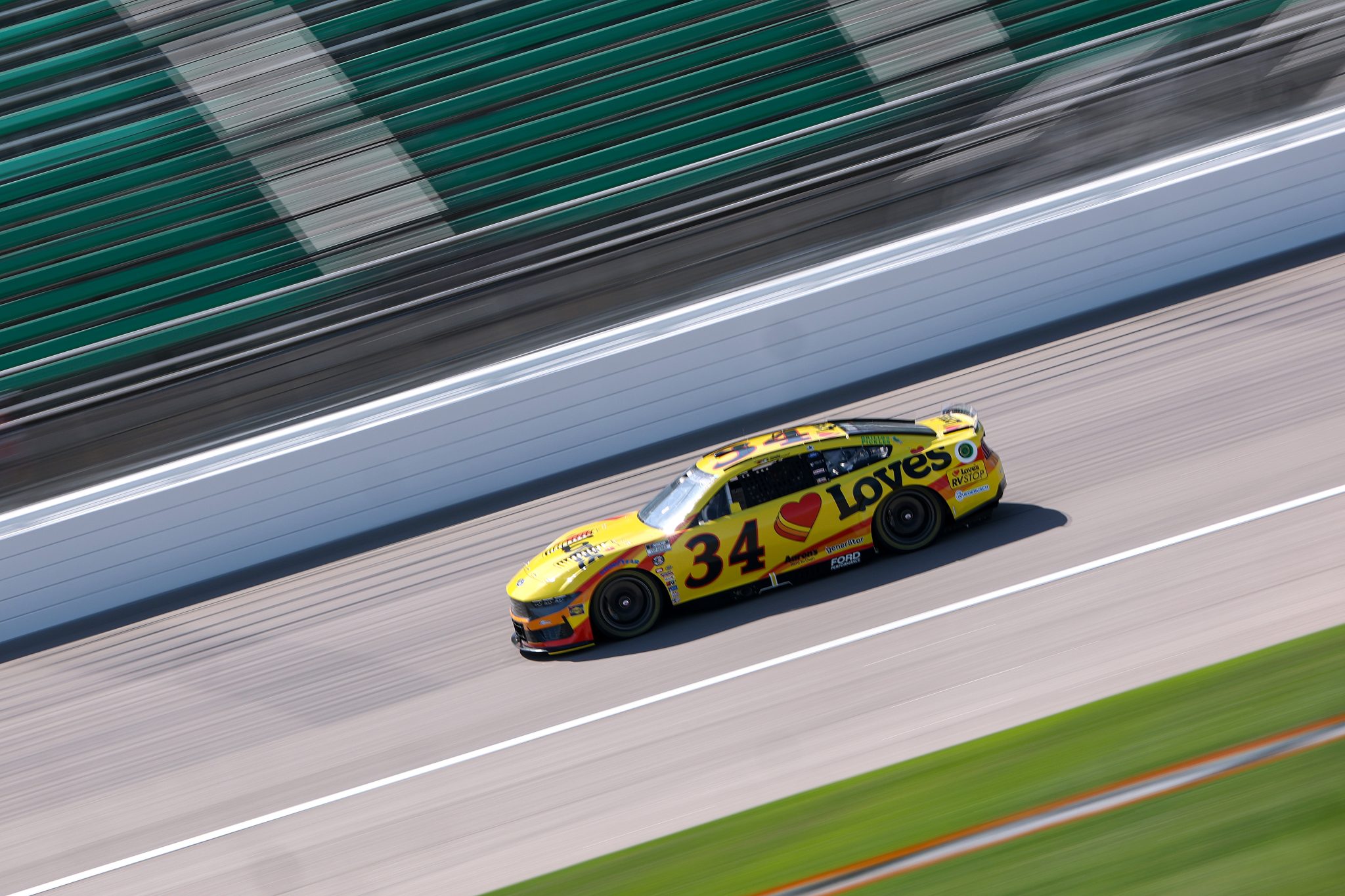 KANSAS CITY, KANSAS - MAY 10: Todd Gilliland, driver of the #34 Love's Travel Stops Ford, drives during qualifying for the NASCAR Cup Series AdventHealth 400 at Kansas Speedway on May 10, 2025 in Kansas City, Kansas. (Photo by Jamie Squire/Getty Images) | Getty Images