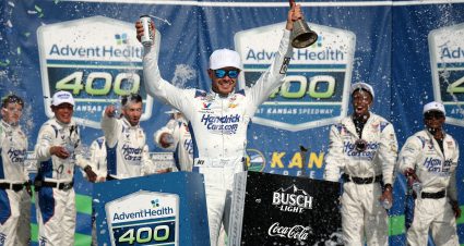 KANSAS CITY, KANSAS - MAY 11: Kyle Larson, driver of the #5 HendrickCars.com Chevrolet, celebrates in victory lane after winning the NASCAR Cup Series AdventHealth 400 at Kansas Speedway on May 11, 2025 in Kansas City, Kansas. (Photo by Chris Graythen/Getty Images) | Getty Images