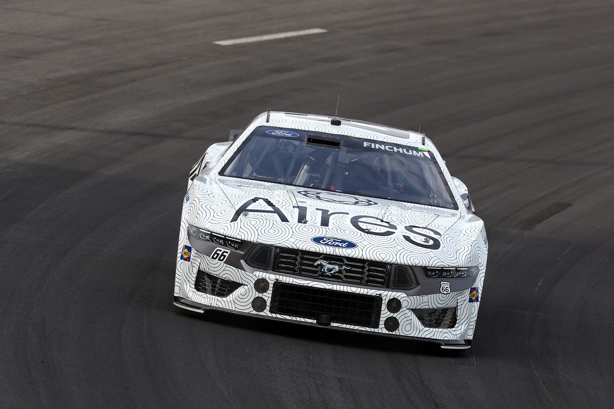 NORTH WILKESBORO, NORTH CAROLINA - MAY 18: Chad Finchum, driver of the #66 AiresTech Ford, drives during the NASCAR Cup Series All-Star Open at North Wilkesboro Speedway on May 18, 2025 in North Wilkesboro, North Carolina. (Photo by David Jensen/Getty Images) | Getty Images