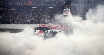NORTH WILKESBORO, NORTH CAROLINA - MAY 18: Christopher Bell, driver of the #20 Mobil 1 Toyota, celebrates with a burnout after winning the NASCAR Cup Series All-Star Race at North Wilkesboro Speedway on May 18, 2025 in North Wilkesboro, North Carolina. (Photo by James Gilbert/Getty Images) | Getty Images