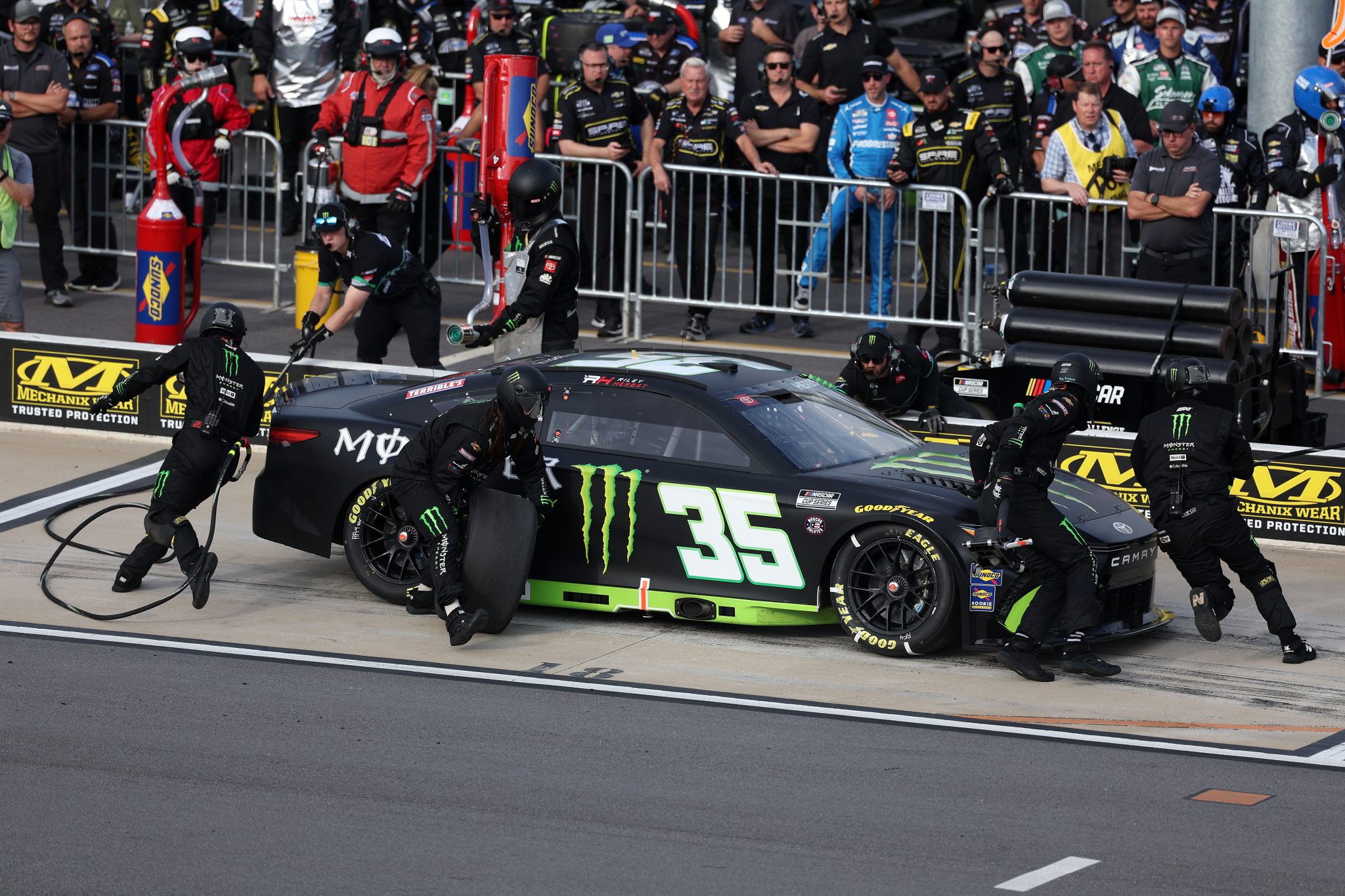 NORTH WILKESBORO, NORTH CAROLINA - MAY 16: Riley Herbst, driver of the #35 Monster Energy Toyota, pits during qualifying for the NASCAR Cup Series All-Star Pit Crew Challenge Open at North Wilkesboro Speedway on May 16, 2025 in North Wilkesboro, North Carolina. (Photo by David Jensen/Getty Images) | Getty Images
