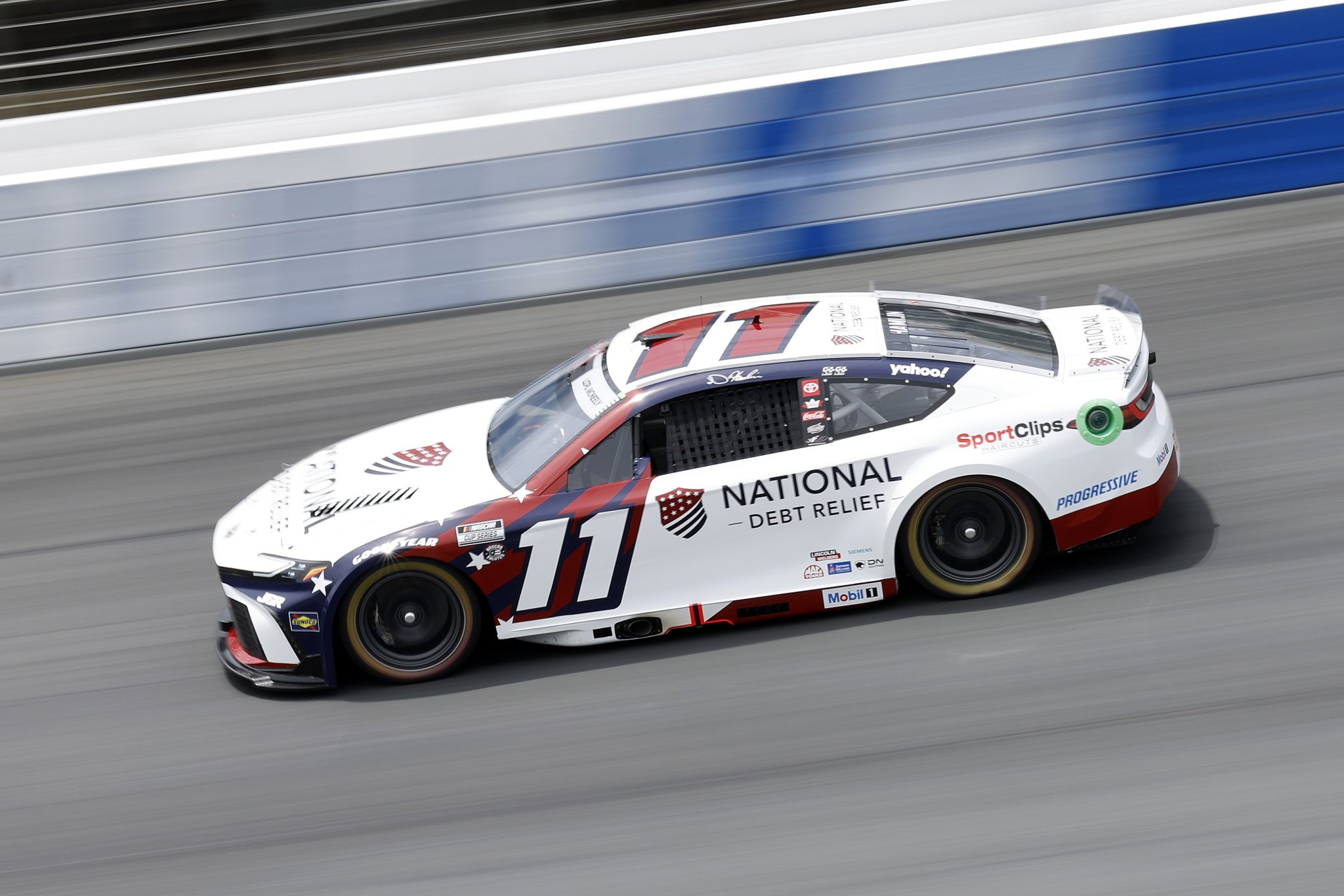 CONCORD, NORTH CAROLINA - MAY 24: Denny Hamlin, driver of the #11 National Debt Relief Toyota, drives during practice for the NASCAR Cup Series Coca-Cola 600 at Charlotte Motor Speedway on May 24, 2025 in Concord, North Carolina. (Photo by Logan Riely/Getty Images) | Getty Images