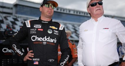 DAYTONA BEACH, FLORIDA - AUGUST 23: Kyle Busch, driver of the #8 Cheddar's Scratch Kitchen Chevrolet, and RCR team owner and NASCAR Hall of Famer, Richard Childress meet on the grid during qualifying for the NASCAR Cup Series Coke Zero Sugar 400 at Daytona International Speedway on August 23, 2024 in Daytona Beach, Florida. (Photo by James Gilbert/Getty Images) | Getty Images