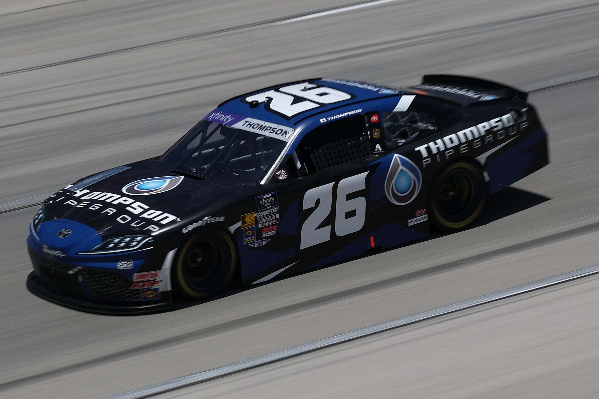 FORT WORTH, TEXAS - MAY 03: Dean Thompson, driver of the #26 Thompson Pipe Group Toyota, drives during the NASCAR Xfinity Series Andy's Frozen Custard 300 at Texas Motor Speedway on May 03, 2025 in Fort Worth, Texas. (Photo by Kenneth Richmond/Getty Images) | Getty Images