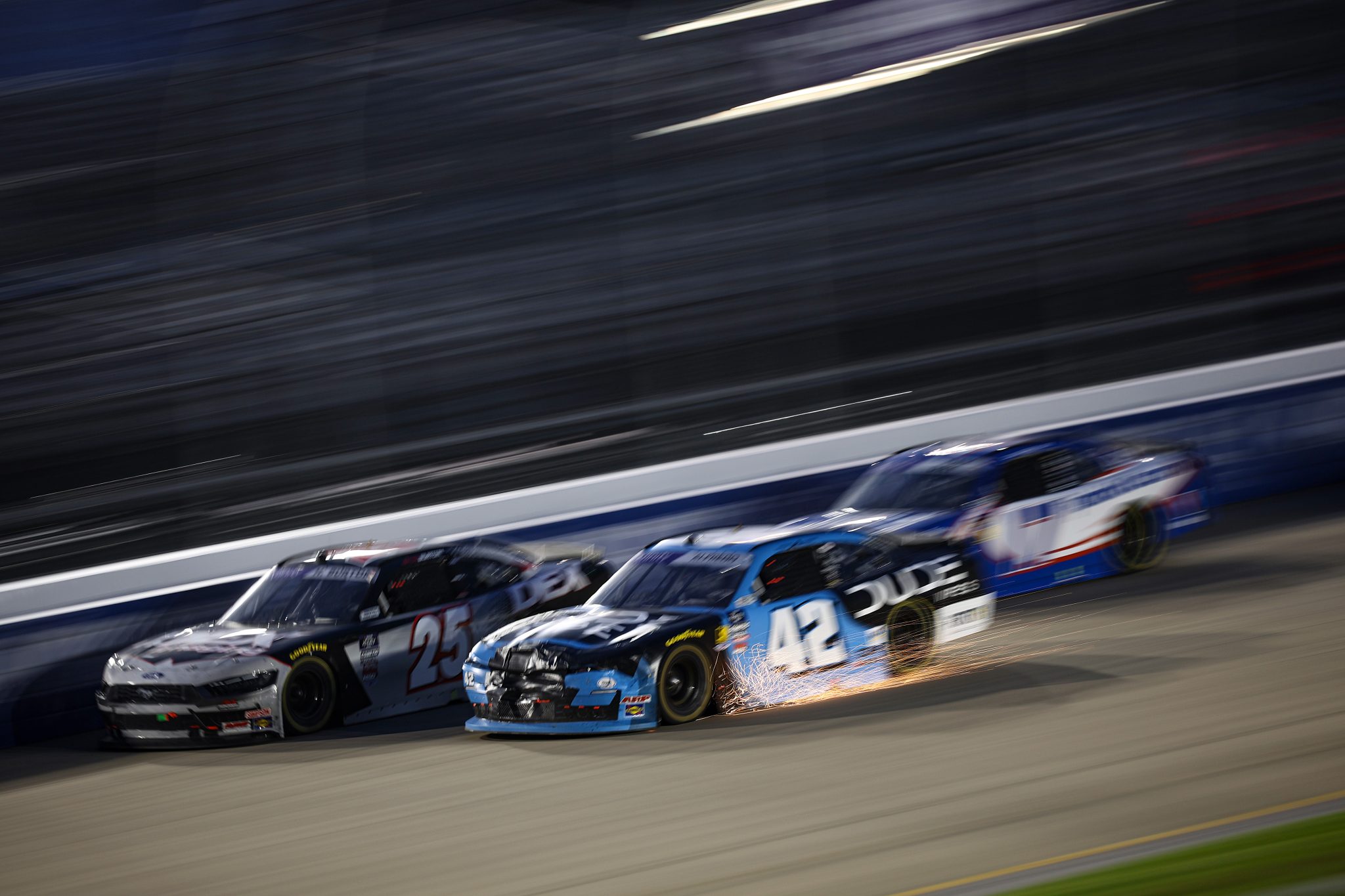 LEBANON, TENNESSEE - MAY 31: Anthony Alfredo, driver of the #42 Dude Wipes Chevrolet, drives with sparks during the NASCAR Xfinity Series Tennessee Lottery 250 at Nashville Superspeedway on May 31, 2025 in Lebanon, Tennessee. (Photo by James Gilbert/Getty Images) | Getty Images