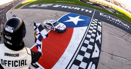 FORT WORTH, TEXAS - MAY 04: Joey Logano, driver of the #22 AAA Insurance Ford, takes the checkered flag to win the NASCAR Cup Series Würth 400 at Texas Motor Speedway on May 04, 2025 in Fort Worth, Texas. (Photo by James Gilbert/Getty Images) | Getty Images
