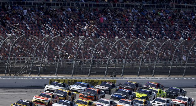 TALLADEGA, ALABAMA - APRIL 26: Jesse Love, driver of the #2 WAT Chevrolet, and Austin Hill, driver of the #21 Bennett Transportation Chevrolet, race during the NASCAR Xfinity Series Ag-Pro 300 at Talladega Superspeedway on April 26, 2025 in Talladega, Alabama. (Photo by Logan Riely/Getty Images) | Getty Images