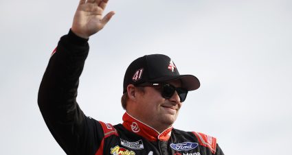 LEBANON, TENNESSEE - JUNE 01: Cole Custer, driver of the #41 HaasTooling.com Ford, waves to fans as he walks onstage during driver intros prior to the NASCAR Cup Series Cracker Barrel 400 at Nashville Superspeedway on June 01, 2025 in Lebanon, Tennessee. (Photo by Sean Gardner/Getty Images) | Getty Images
