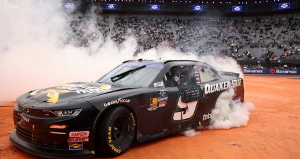 MEXICO CITY, MEXICO - JUNE 14: Daniel Suarez, driver of the #9 Quaker State Chevrolet, celebrates with a burnout after winning the NASCAR Xfinity Series The Chilango 150 at Autodromo Hermanos Rodriguez on June 14, 2025 in Mexico City, Mexico. (Photo by James Gilbert/Getty Images) | Getty Images
