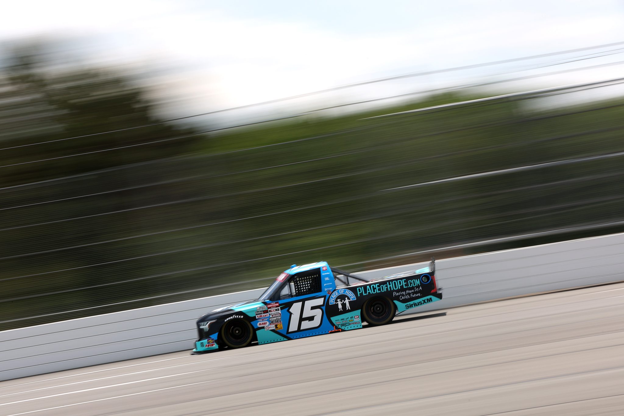 LONG POND, PENNSYLVANIA - JUNE 20: Tanner Gray, driver of the #15 Place of Hope Toyota, drives during practice for the NASCAR Craftsman Truck Series MillerTech Battery 200 at Pocono Raceway on June 20, 2025 in Long Pond, Pennsylvania. (Photo by Meg Oliphant/Getty Images) | Getty Images