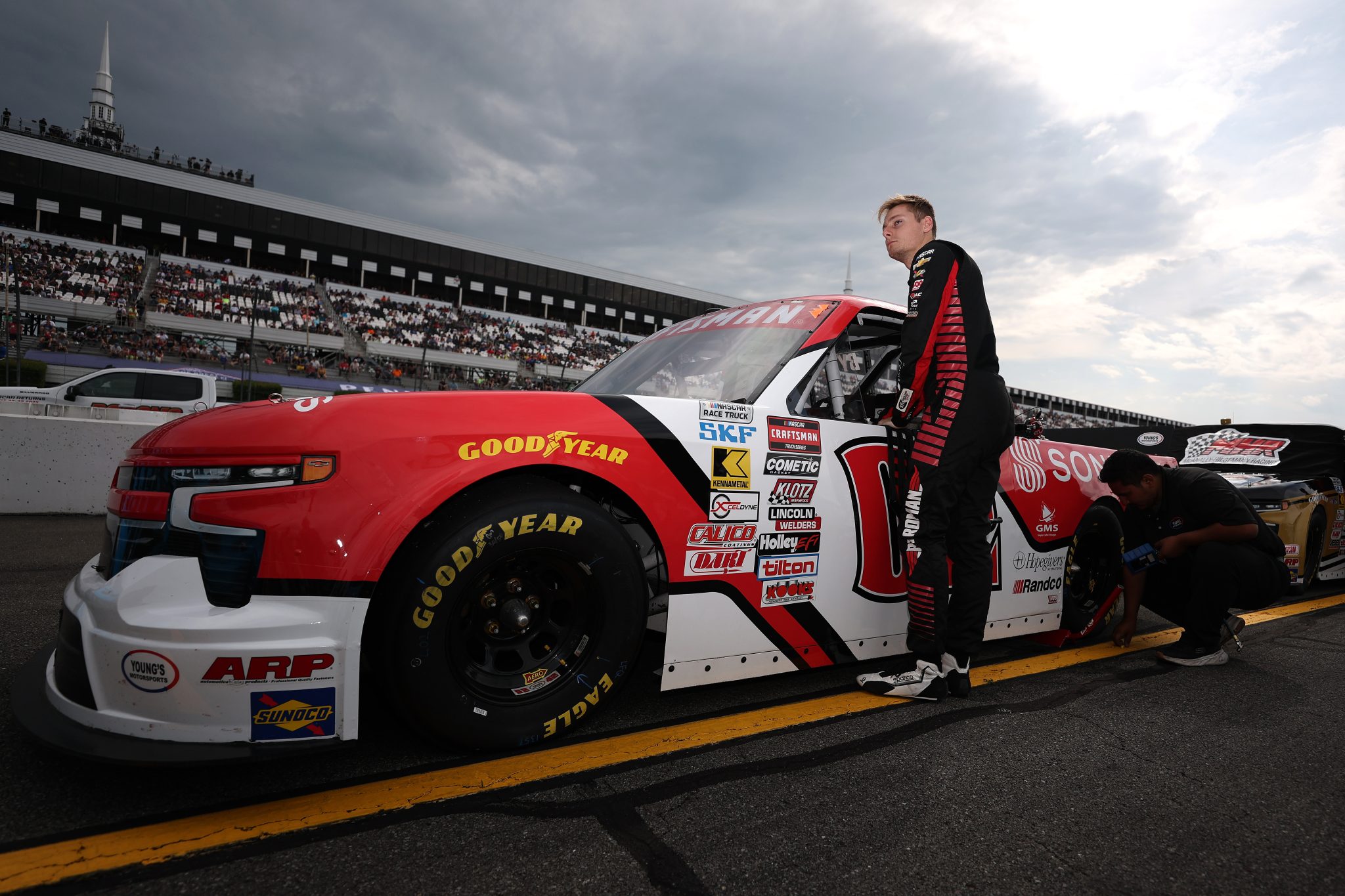 LONG POND, PENNSYLVANIA - JUNE 20: Nathan Byrd, driver of the #2 RCA/Sonesta Chevrolet, waits on the grid prior to the NASCAR Craftsman Truck Series MillerTech Battery 200 at Pocono Raceway on June 20, 2025 in Long Pond, Pennsylvania. (Photo by Meg Oliphant/Getty Images) | Getty Images