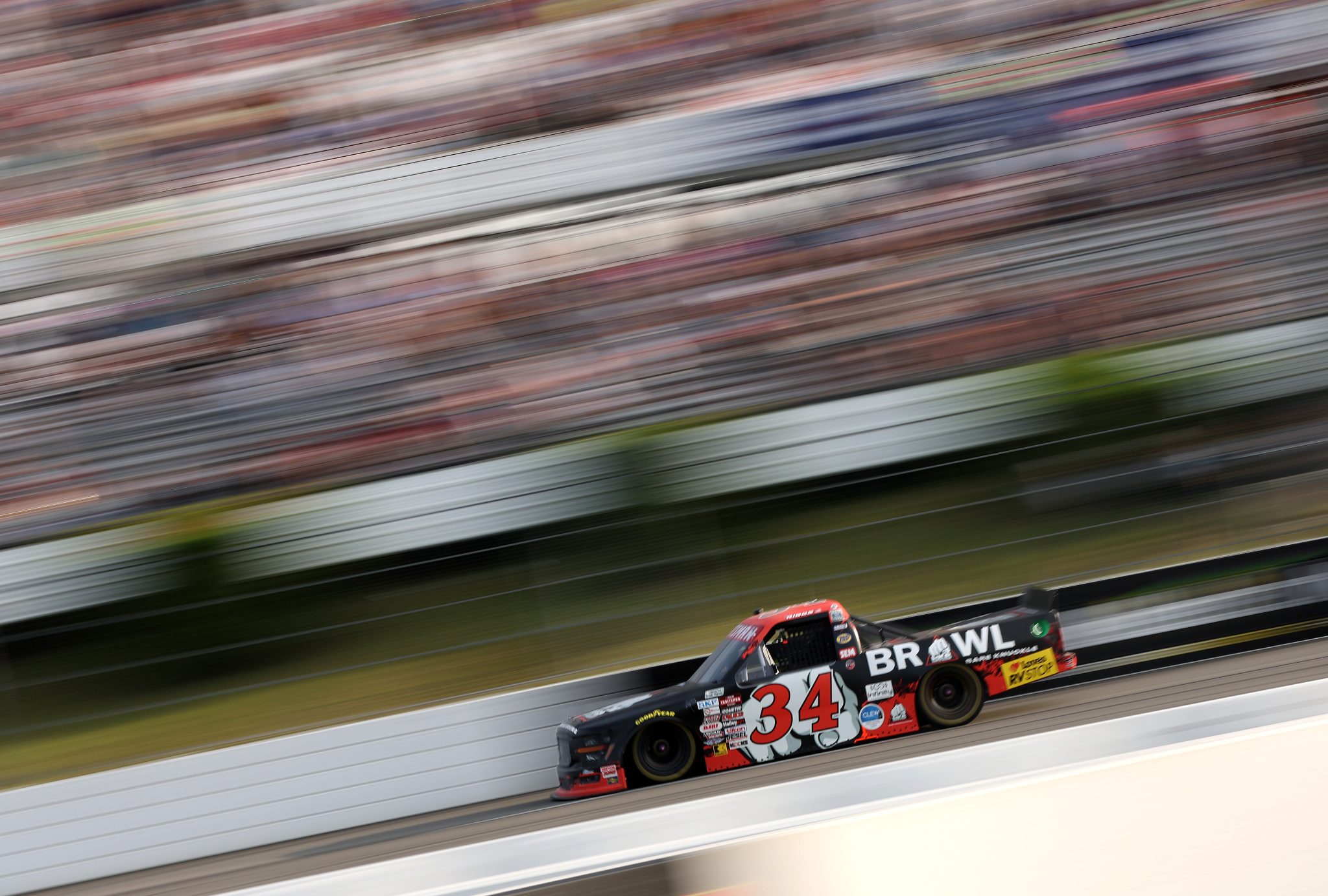 LONG POND, PENNSYLVANIA - JUNE 20: Layne Riggs, driver of the #34 Bare Knuckle Brawl Ford, drives during the NASCAR Craftsman Truck Series MillerTech Battery 200 at Pocono Raceway on June 20, 2025 in Long Pond, Pennsylvania. (Photo by Meg Oliphant/Getty Images) | Getty Images