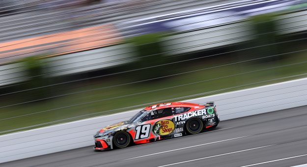 LONG POND, PENNSYLVANIA - JUNE 21: Chase Briscoe, driver of the #19 Bass Pro Shops Toyota, drives during qualifying for the NASCAR Cup Series The Great American Getaway 400 at Pocono Raceway on June 21, 2025 in Long Pond, Pennsylvania. (Photo by Meg Oliphant/Getty Images) | Getty Images