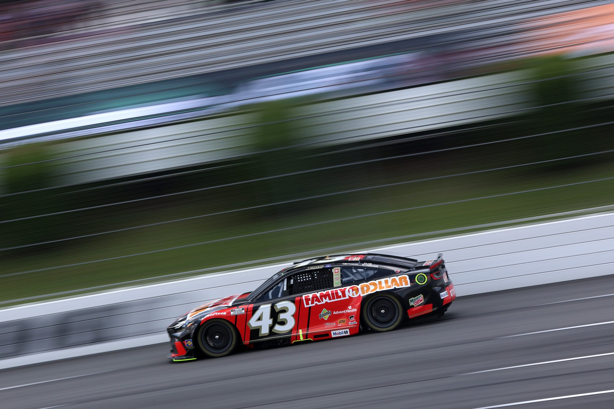 LONG POND, PENNSYLVANIA - JUNE 21: Erik Jones, driver of the #43 Family Dollar Toyota, drives during qualifying for the NASCAR Cup Series The Great American Getaway 400 at Pocono Raceway on June 21, 2025 in Long Pond, Pennsylvania. (Photo by Meg Oliphant/Getty Images) | Getty Images