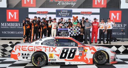 LONG POND, PENNSYLVANIA - JUNE 21: Connor Zilisch, driver of the #88 Registix Chevrolet, and crew celebrate in victory lane after winning the NASCAR Xfinity Series Explore the Pocono Mountains 250 at Pocono Raceway on June 21, 2025 in Long Pond, Pennsylvania. (Photo by Jonathan Bachman/Getty Images) | Getty Images