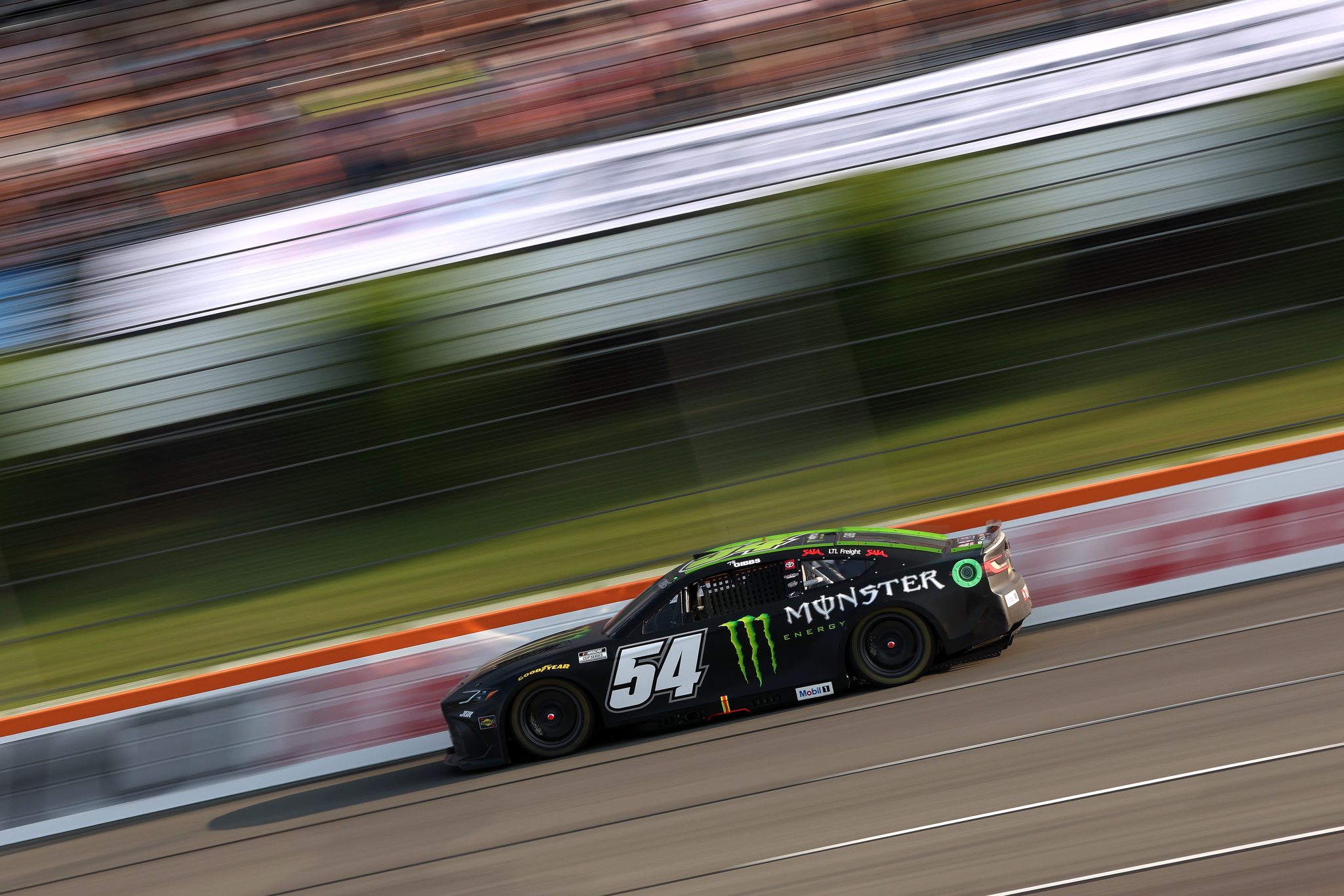 LONG POND, PENNSYLVANIA - JUNE 22: Ty Gibbs, driver of the #54 Monster Energy Toyota, drives during the NASCAR Cup Series The Great American Getaway 400 at Pocono Raceway on June 22, 2025 in Long Pond, Pennsylvania. (Photo by Meg Oliphant/Getty Images) | Getty Images