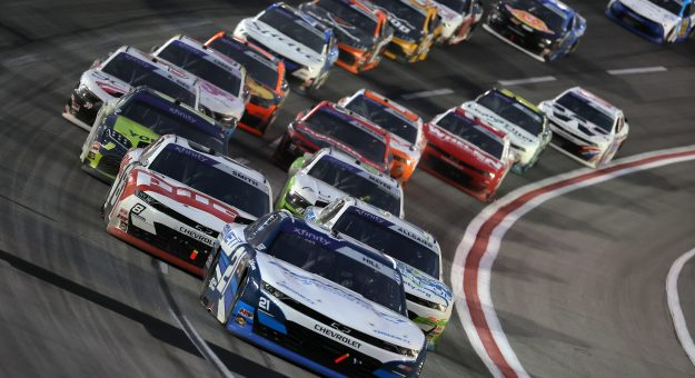 HAMPTON, GEORGIA - FEBRUARY 22: Austin Hill, driver of the #21 Bennett Transportation Chevrolet, leads the field during the NASCAR Xfinity Series Bennett Transportation and Logistics 250 at Atlanta Motor Speedway on February 22, 2025 in Hampton, Georgia. (Photo by Jonathan Bachman/Getty Images) | Getty Images