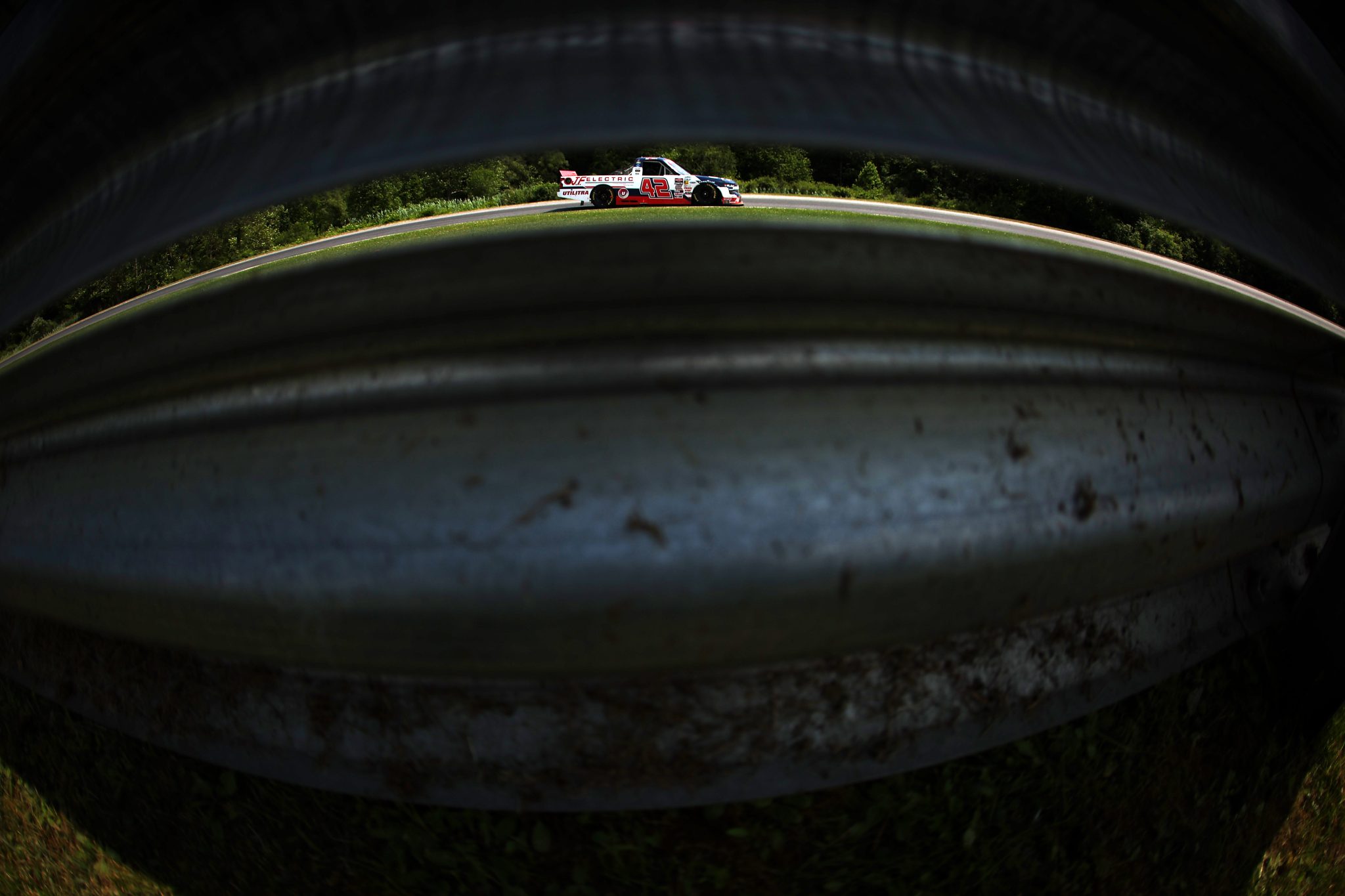 LAKEVILLE, CONNECTICUT - JUNE 28: Matt Mills, driver of the #42 J.F. Electric/Utilitra Chevrolet, drives during the NASCAR Craftsman Truck Series LiUNA! 150 at Lime Rock Park on June 28, 2025 in Lakeville, Connecticut. (Photo by Jonathan Bachman/Getty Images) | Getty Images