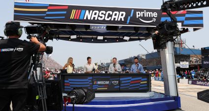 BROOKLYN, MICHIGAN - JUNE 08: A general view of the NASCAR on Prime Video broadcast team Danielle Trotta, Carl Edwards, Dale Earnhardt Jr. and Corey LaJoie talk on set prior to the NASCAR Cup Series FireKeepers Casino 400 at Michigan International Speedway on June 08, 2025 in Brooklyn, Michigan. (Photo by Meg Oliphant/Getty Images) | Getty Images