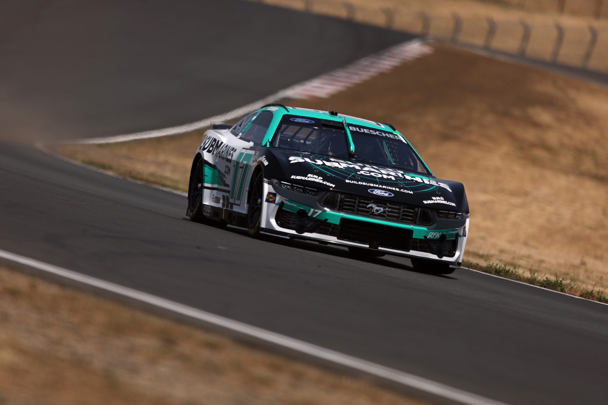 SONOMA, CALIFORNIA - JULY 12: Chris Buescher, driver of the #17 BuildSubmarines.com Ford, drives during qualifying for the NASCAR Cup Series Toyota/Save Mart 350 at Sonoma Raceway on July 12, 2025 in Sonoma, California. (Photo by Meg Oliphant/Getty Images) | Getty Images