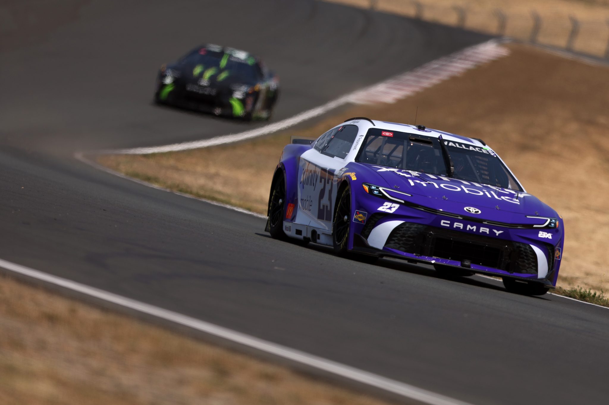 SONOMA, CALIFORNIA - JULY 12: Bubba Wallace, driver of the #23 Xfinity Mobile Toyota, drives during qualifying for the NASCAR Cup Series Toyota/Save Mart 350 at Sonoma Raceway on July 12, 2025 in Sonoma, California. (Photo by Meg Oliphant/Getty Images) | Getty Images