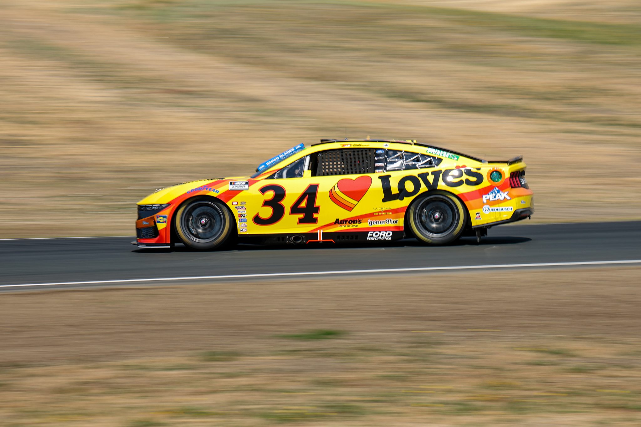 SONOMA, CALIFORNIA - JULY 12: Todd Gilliland, driver of the #34 Love's Travel Stops Ford, drives during qualifying for the NASCAR Cup Series Toyota/Save Mart 350 at Sonoma Raceway on July 12, 2025 in Sonoma, California. (Photo by Chris Graythen/Getty Images) | Getty Images