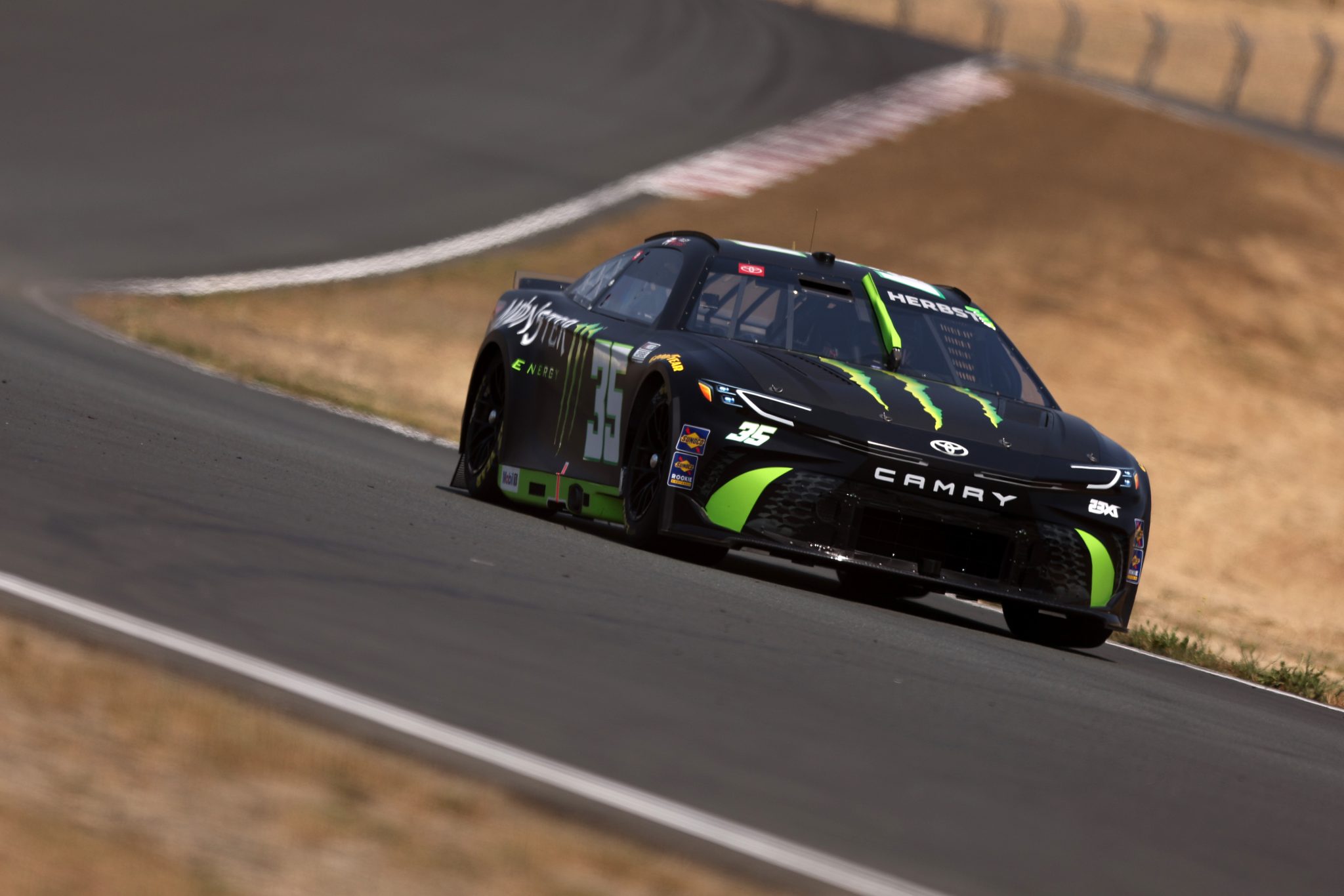 SONOMA, CALIFORNIA - JULY 12: Riley Herbst, driver of the #35 Monster Energy Toyota, drives during qualifying for the NASCAR Cup Series Toyota/Save Mart 350 at Sonoma Raceway on July 12, 2025 in Sonoma, California. (Photo by Meg Oliphant/Getty Images) | Getty Images
