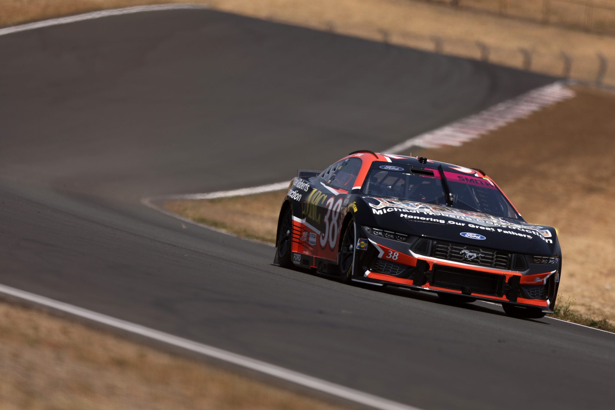 SONOMA, CALIFORNIA - JULY 12: Zane Smith, driver of the #38 Michael Roberts Construction Ford, drives during qualifying for the NASCAR Cup Series Toyota/Save Mart 350 at Sonoma Raceway on July 12, 2025 in Sonoma, California. (Photo by Meg Oliphant/Getty Images) | Getty Images