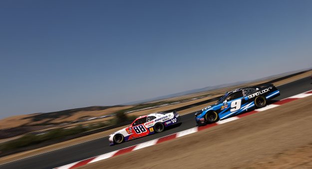SONOMA, CALIFORNIA - JULY 12: Connor Zilisch, driver of the #88 Roto-Rooter Chevrolet, leads Shane Van Gisbergen, driver of the #9 Quad Lock Chevrolet, during the NASCAR Xfinity Series Pit Boss/FoodMaxx 250 at Sonoma Raceway on July 12, 2025 in Sonoma, California. (Photo by Meg Oliphant/Getty Images) | Getty Images