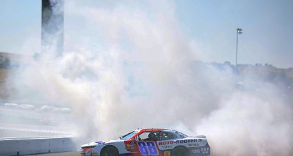 SONOMA, CALIFORNIA - JULY 12: Connor Zilisch, driver of the #88 Roto-Rooter Chevrolet, celebrates with a burnout after winning the NASCAR Xfinity Series Pit Boss/FoodMaxx 250 at Sonoma Raceway on July 12, 2025 in Sonoma, California. (Photo by Chris Graythen/Getty Images) | Getty Images
