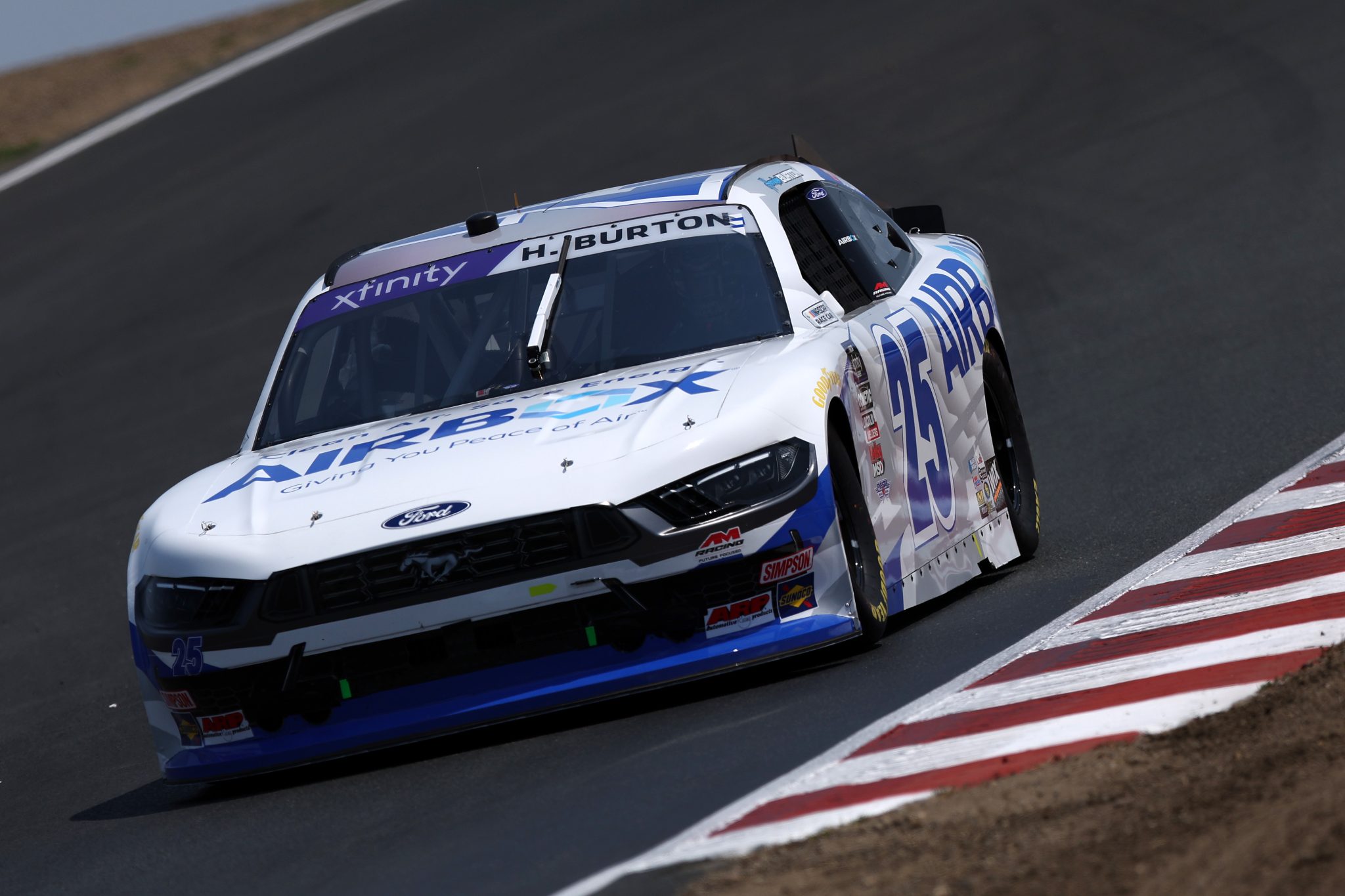 SONOMA, CALIFORNIA - JULY 11: Harrison Burton, driver of the #25 AirBox Ford, drives during qualifying for the NASCAR Xfinity Series Pit Boss/FoodMaxx 250 at Sonoma Raceway on July 11, 2025 in Sonoma, California. (Photo by Meg Oliphant/Getty Images) | Getty Images