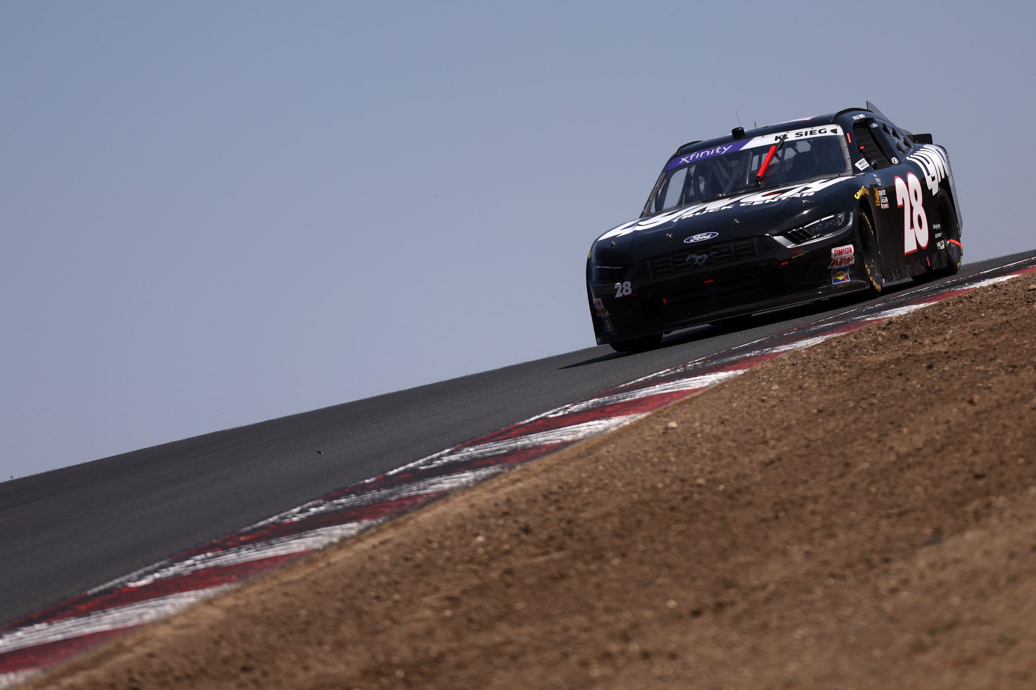 SONOMA, CALIFORNIA - JULY 12: Kyle Sieg, driver of the #28 RSS Racing Ford, drives during the NASCAR Xfinity Series Pit Boss/FoodMaxx 250 at Sonoma Raceway on July 12, 2025 in Sonoma, California. (Photo by Meg Oliphant/Getty Images) | Getty Images
