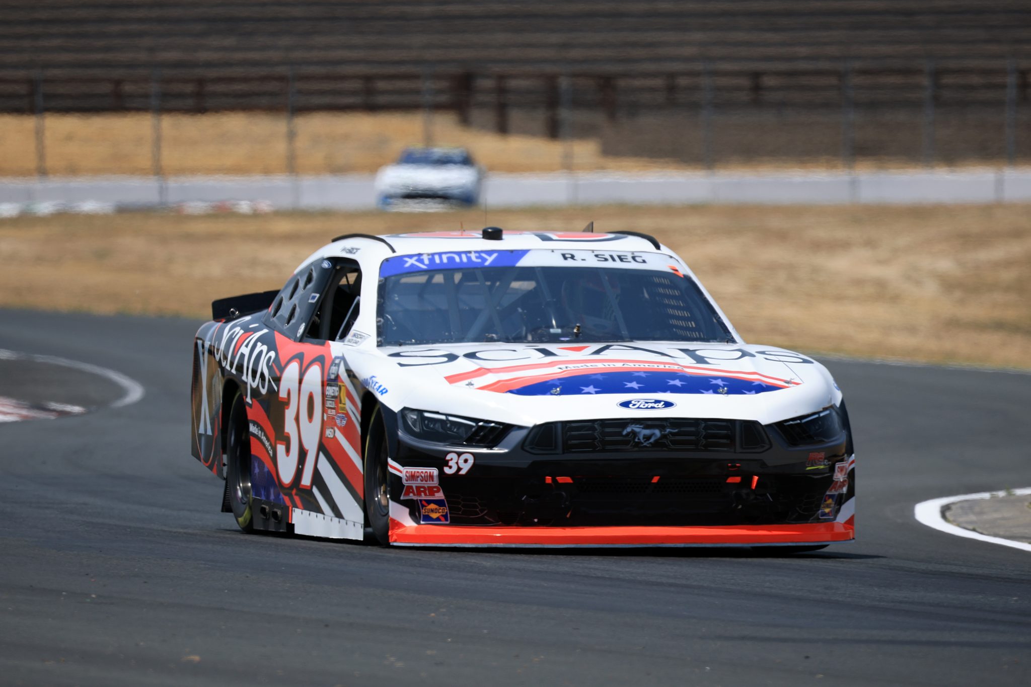 SONOMA, CALIFORNIA - JULY 11: Ryan Sieg, driver of the #39 Sci Aps Ford, drives during qualifying for the NASCAR Xfinity Series Pit Boss/FoodMaxx 250 at Sonoma Raceway on July 11, 2025 in Sonoma, California. (Photo by Chris Graythen/Getty Images) | Getty Images