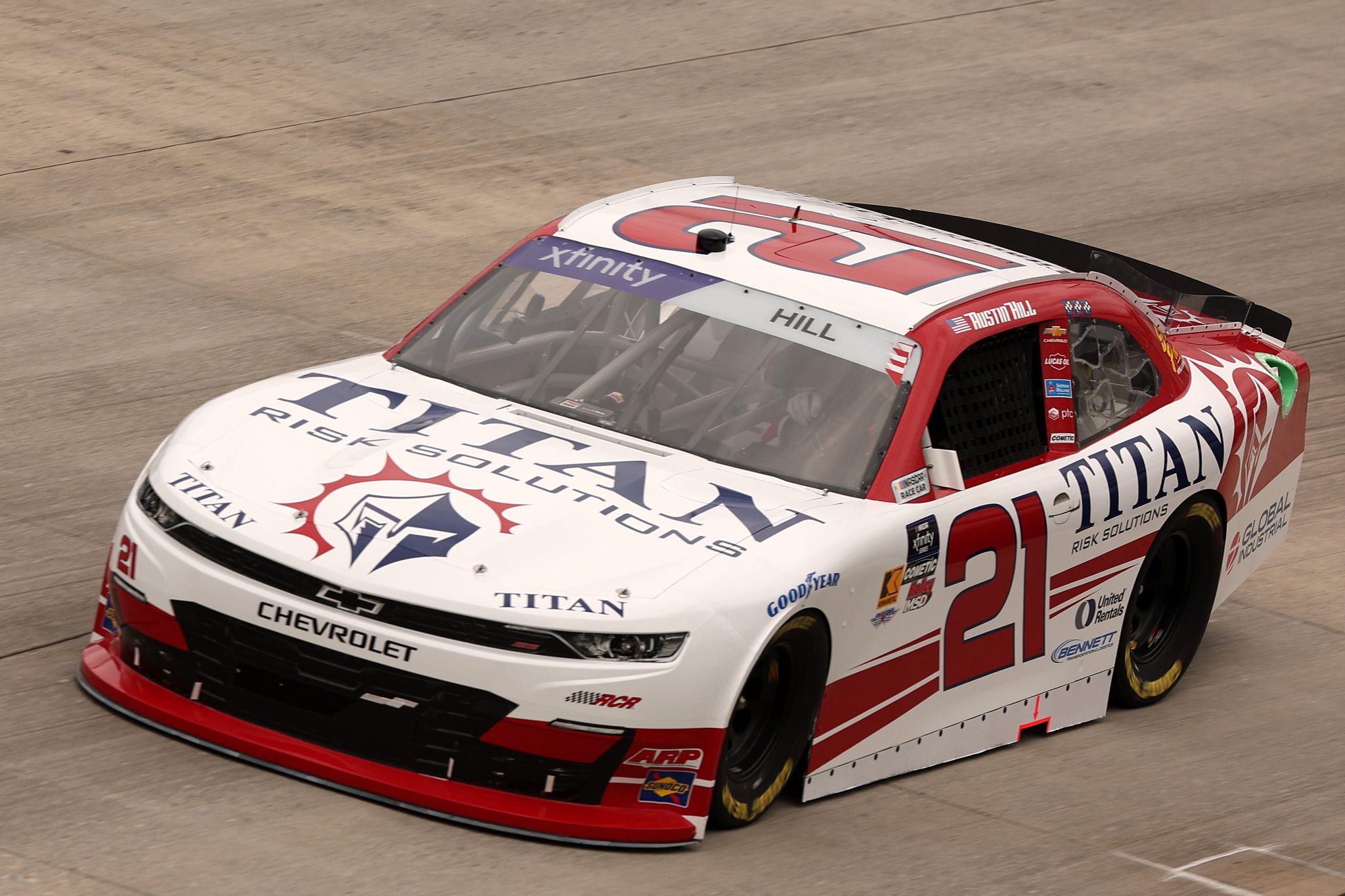 DOVER, DELAWARE - JULY 19: Austin Hill, driver of the #21 Titan Risk Solutions Chevrolet, drives during practice for the NASCAR Xfinity Series BetRivers 200 at Dover Motor Speedway on July 19, 2025 in Dover, Delaware. (Photo by Meg Oliphant/Getty Images) | Getty Images