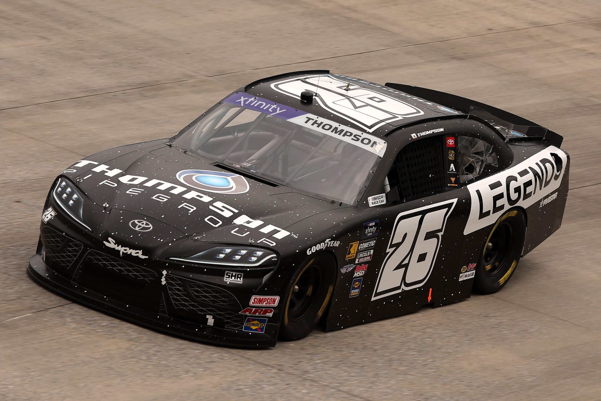 DOVER, DELAWARE - JULY 19: Dean Thompson, driver of the #26 Thompson Pipe Group / Legends Toyota, drives during practice for the NASCAR Xfinity Series BetRivers 200 at Dover Motor Speedway on July 19, 2025 in Dover, Delaware. (Photo by Meg Oliphant/Getty Images) | Getty Images
