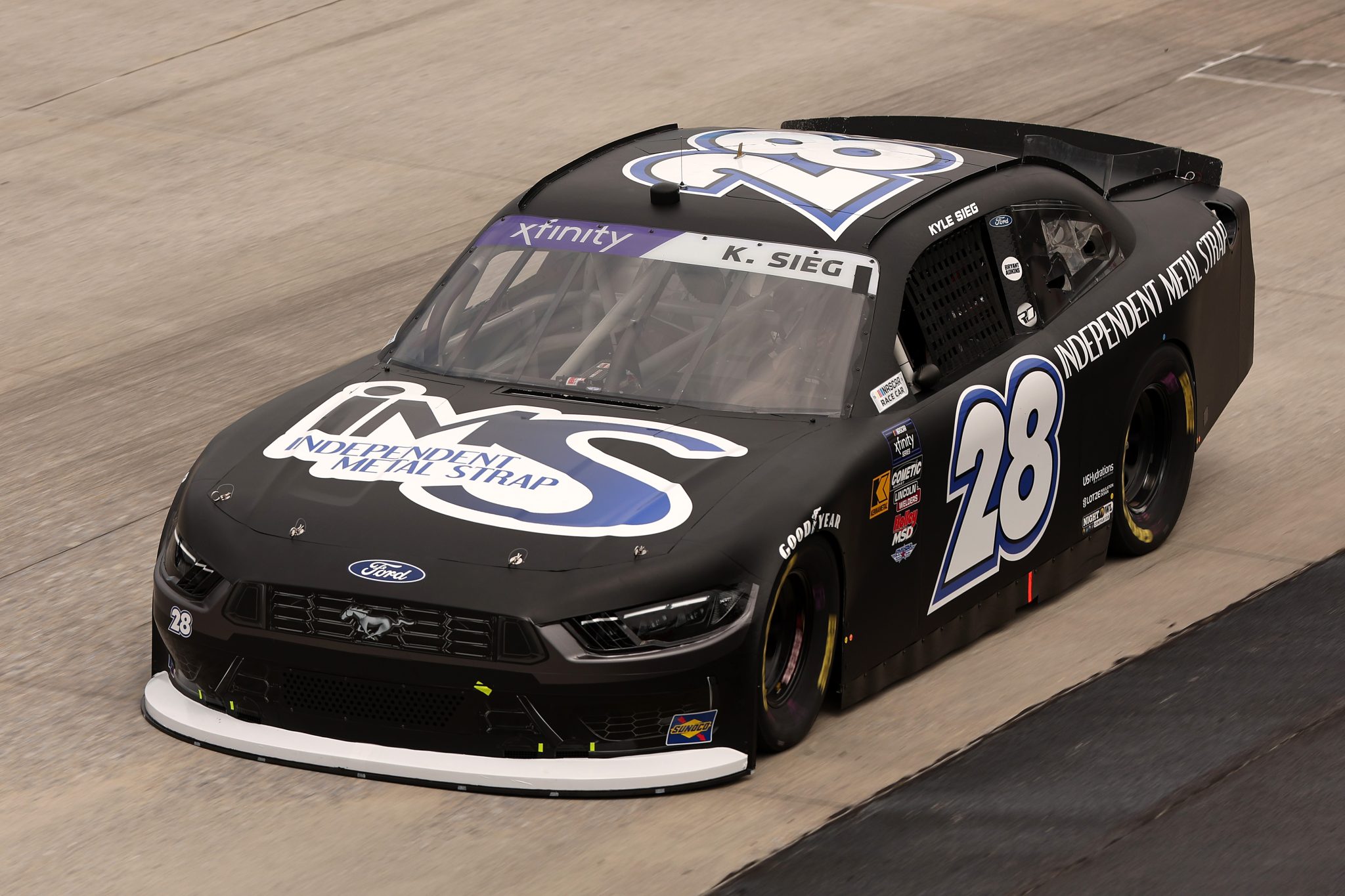 DOVER, DELAWARE - JULY 19: Kyle Sieg, driver of the #28 ISM Ford, drives during practice for the NASCAR Xfinity Series BetRivers 200 at Dover Motor Speedway on July 19, 2025 in Dover, Delaware. (Photo by Meg Oliphant/Getty Images) | Getty Images