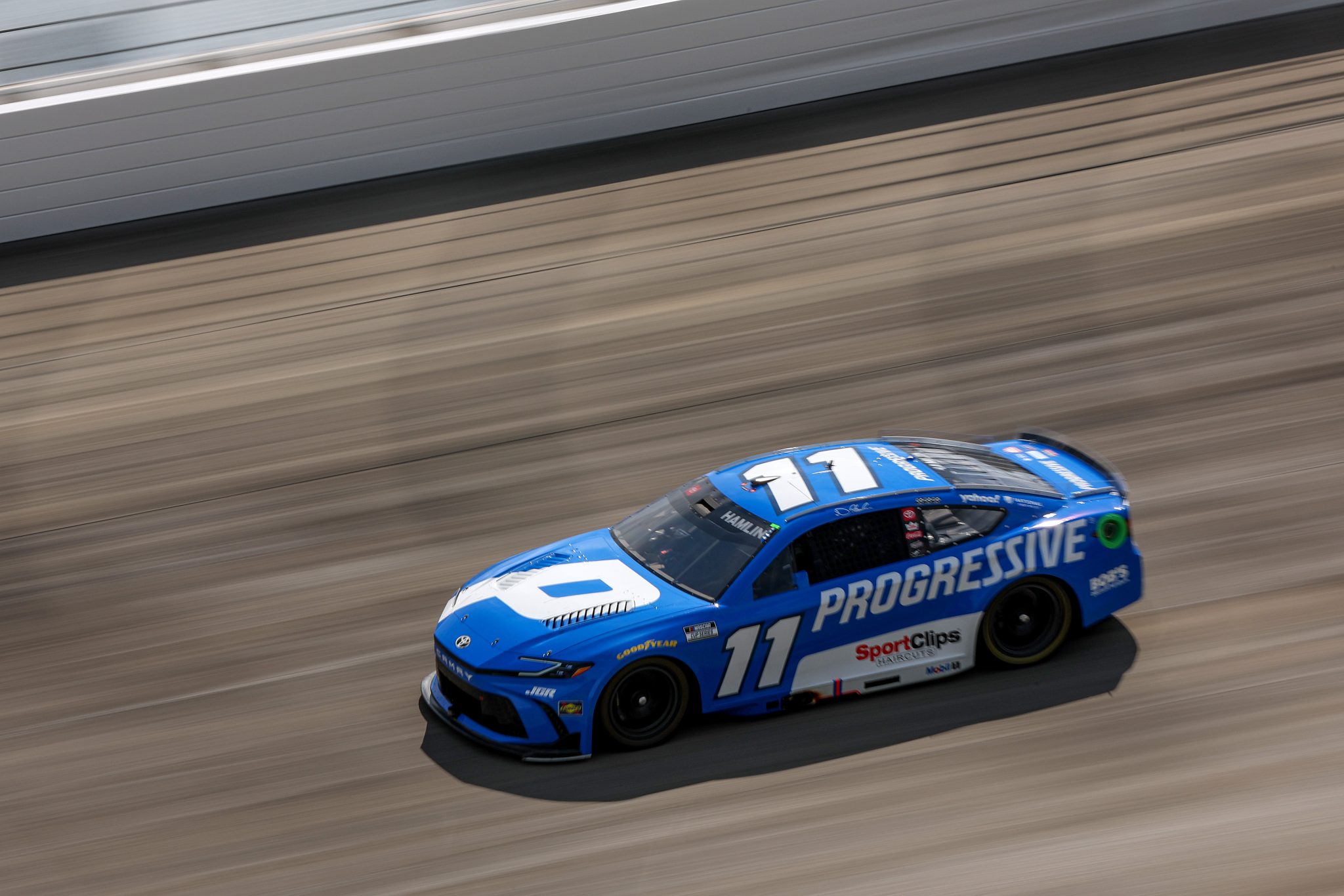 DOVER, DELAWARE - JULY 20: Denny Hamlin, driver of the #11 Progressive Toyota, drives during the NASCAR Cup Series AutoTrader EchoPark Automotive 400 at Dover Motor Speedway on July 20, 2025 in Dover, Delaware. (Photo by Meg Oliphant/Getty Images) | Getty Images