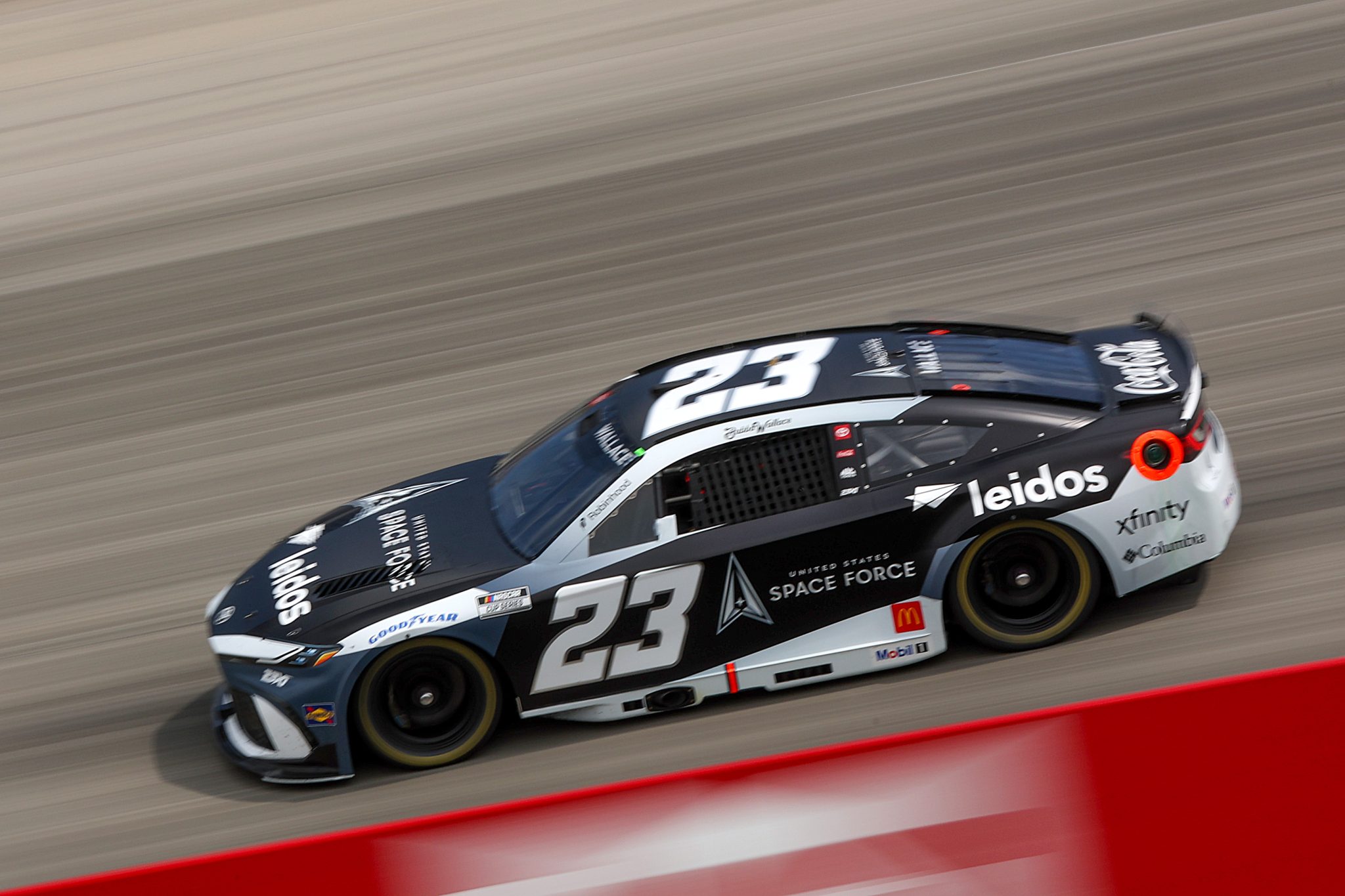 DOVER, DELAWARE - JULY 20: Bubba Wallace, driver of the #23 Space Force/Leidos Toyota, drives during the NASCAR Cup Series AutoTrader EchoPark Automotive 400 at Dover Motor Speedway on July 20, 2025 in Dover, Delaware. (Photo by Meg Oliphant/Getty Images) | Getty Images
