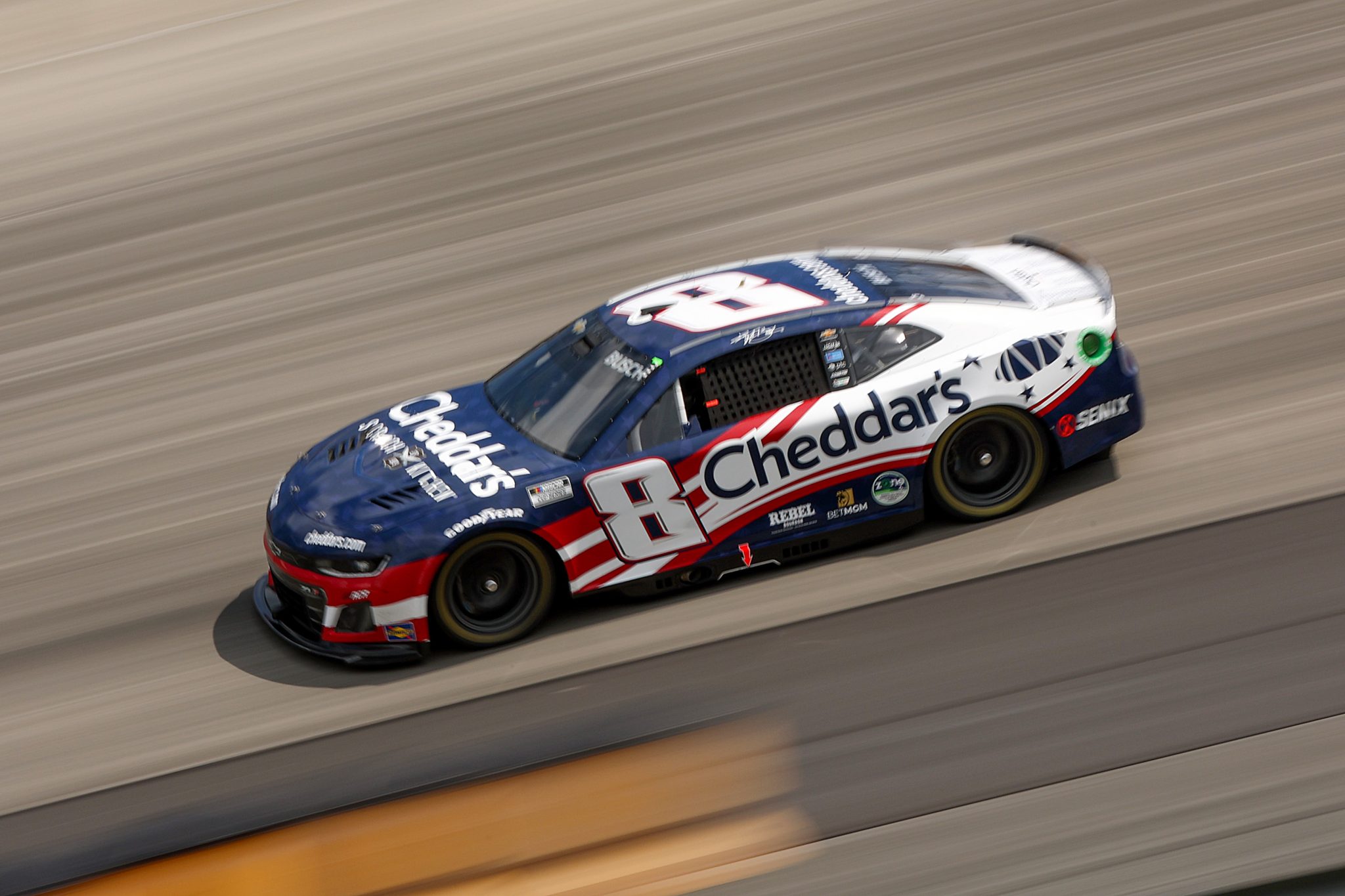 DOVER, DELAWARE - JULY 20: Kyle Busch, driver of the #8 Cheddar's Patriotic Chevrolet, drives during the NASCAR Cup Series AutoTrader EchoPark Automotive 400 at Dover Motor Speedway on July 20, 2025 in Dover, Delaware. (Photo by Meg Oliphant/Getty Images) | Getty Images
