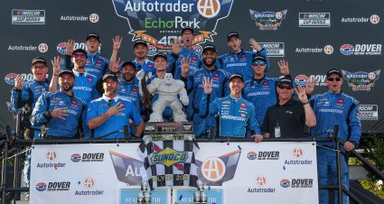 DOVER, DELAWARE - JULY 20: Denny Hamlin, driver of the #11 Progressive Toyota, and crew celebrate in victory lane after winning the NASCAR Cup Series AutoTrader EchoPark Automotive 400 at Dover Motor Speedway on July 20, 2025 in Dover, Delaware. (Photo by Meg Oliphant/Getty Images) | Getty Images