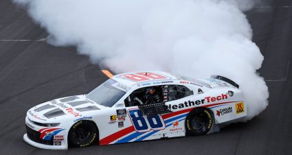 INDIANAPOLIS, INDIANA - JULY 26: Connor Zilisch, driver of the #88 WeatherTech Chevrolet, celebrates with a burnout after winning the NASCAR Xfinity Series Pennzoil 250 and JR Motorsports 100th NASCAR Xfinity Series win at Indianapolis Motor Speedway on July 26, 2025 in Indianapolis, Indiana. (Photo by James Gilbert/Getty Images) | Getty Images