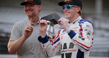 INDIANAPOLIS, INDIANA - JULY 26: Connor Zilisch, driver of the #88 WeatherTech Chevrolet, and Hall of Famer and JR Motorsports team owner, Dale Earnhardt Jr. pose for photos after winning the NASCAR Xfinity Series Pennzoil 250 and JR Motorsports 100th NASCAR Xfinity Series win at Indianapolis Motor Speedway on July 26, 2025 in Indianapolis, Indiana. (Photo by Jonathan Bachman/Getty Images) | Getty Images