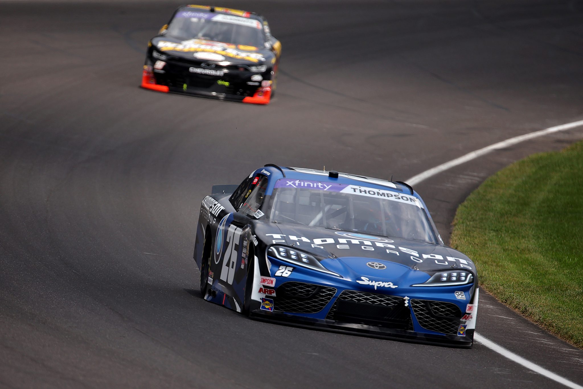 INDIANAPOLIS, INDIANA - JULY 25: Dean Thompson, driver of the #26 Thompson Pipe Group Toyota, drives during practice for the NASCAR Xfinity Series Pennzoil 250 at Indianapolis Motor Speedway on July 25, 2025 in Indianapolis, Indiana. (Photo by Jonathan Bachman/Getty Images) | Getty Images