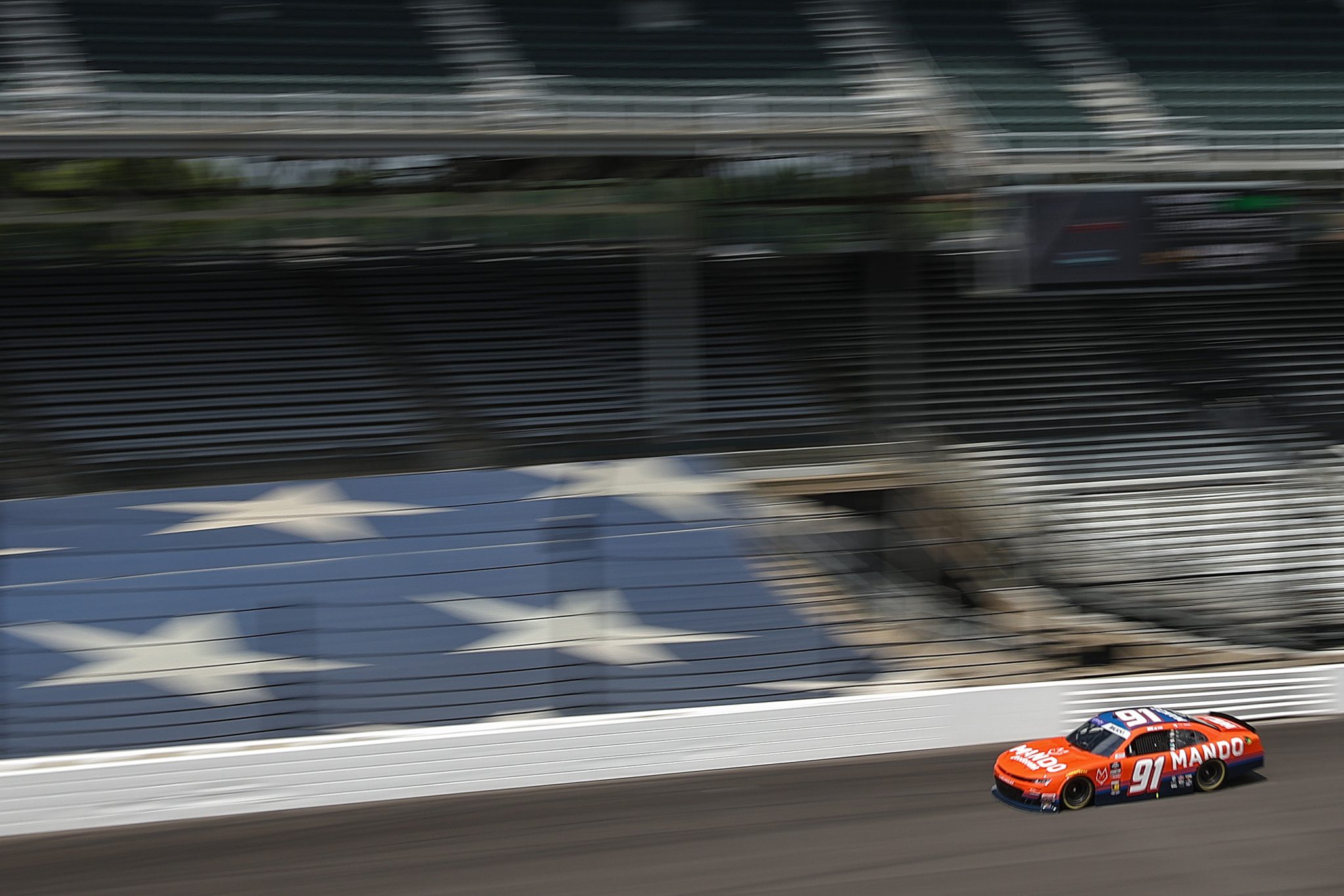 INDIANAPOLIS, INDIANA - JULY 25: Josh Bilicki, driver of the #91 Mando Deodorant Chevrolet, drives during practice for the NASCAR Xfinity Series Pennzoil 250 at Indianapolis Motor Speedway on July 25, 2025 in Indianapolis, Indiana. (Photo by James Gilbert/Getty Images) | Getty Images