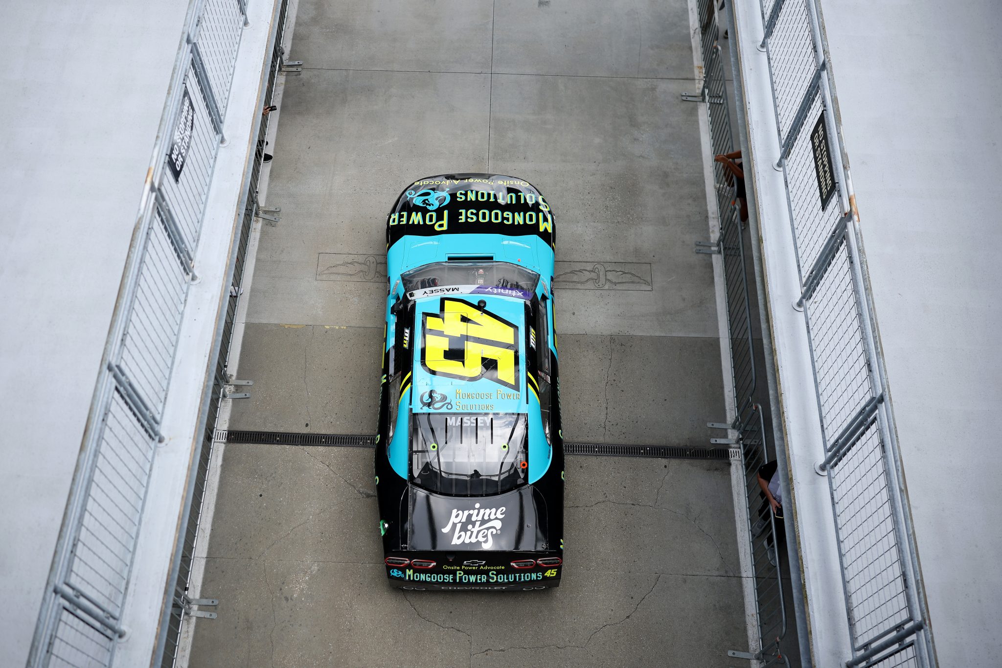 INDIANAPOLIS, INDIANA - JULY 25: Mason Massey, driver of the #45 Mongoose Power Solutions Chevrolet, drives through the garage area during practice for the NASCAR Xfinity Series Pennzoil 250 at Indianapolis Motor Speedway on July 25, 2025 in Indianapolis, Indiana. (Photo by James Gilbert/Getty Images) | Getty Images