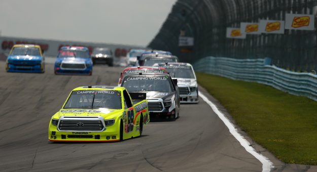 WATKINS GLEN, NEW YORK - AUGUST 07: Matt Crafton, driver of the #88 Ideal Door/Menards Toyota, leads the field during the NASCAR Camping World Truck Series United Rentals 176 at Watkins Glen International on August 07, 2021 in Watkins Glen, New York. (Photo by Sean Gardner/Getty Images) | Getty Images