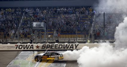 NEWTON, IOWA - JUNE 16: Ryan Blaney, driver of the #12 Advance Auto Parts Ford, celebrates with a burnout after winning the NASCAR Cup Series Iowa Corn 350 at Iowa Speedway on June 16, 2024 in Newton, Iowa.  (Photo by Sean Gardner/Getty Images)