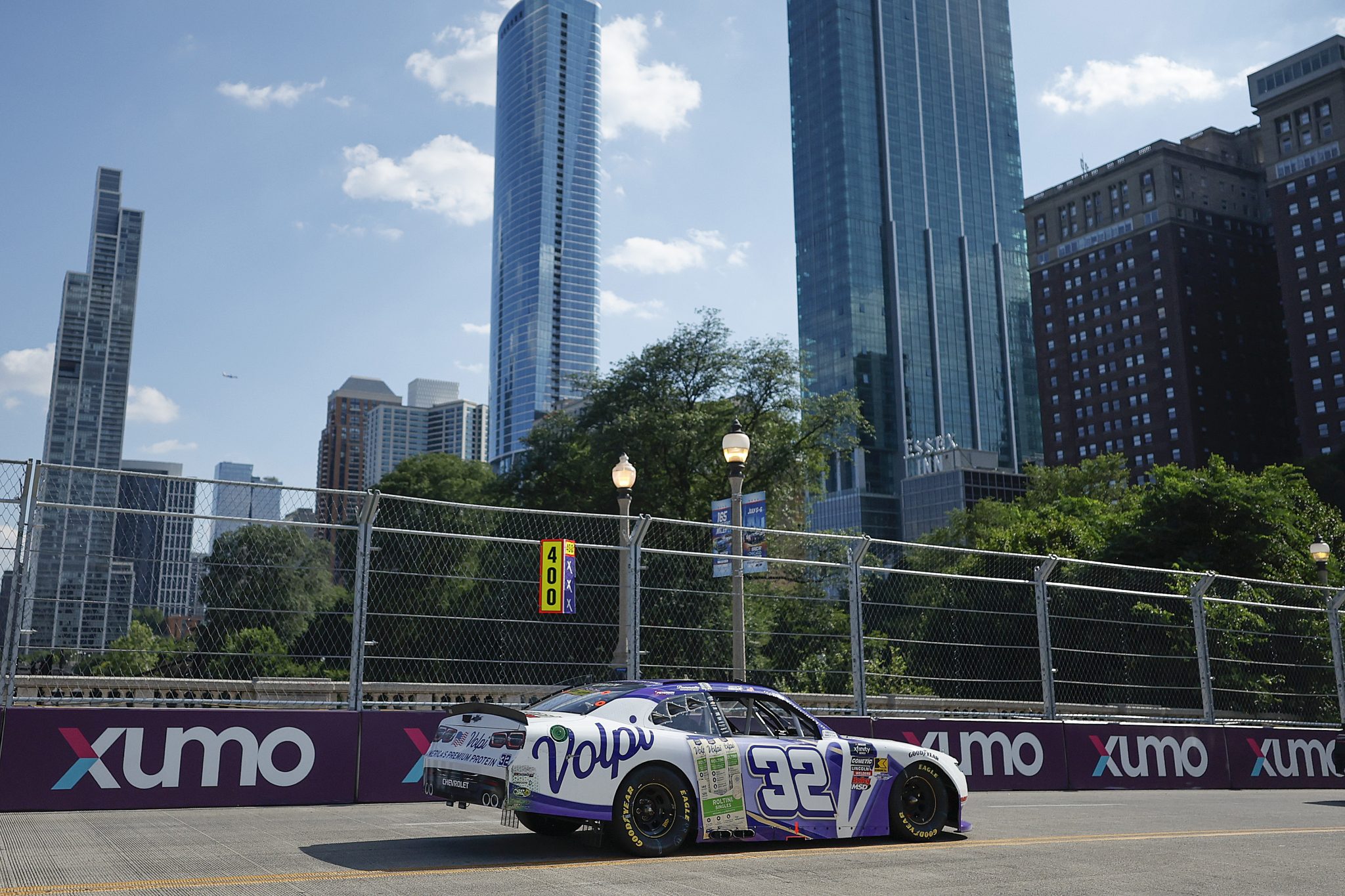 CHICAGO, ILLINOIS - JULY 05: Austin Green, driver of the #32 Volpi Chevrolet, drives during the NASCAR Xfinity Series The Loop 110 at Chicago Street Course on July 05, 2025 in Chicago, Illinois. (Photo by Logan Riely/Getty Images) | Getty Images